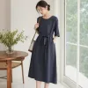 A new summer style of dark blue dress for women, which is slimming and shaping details Picture